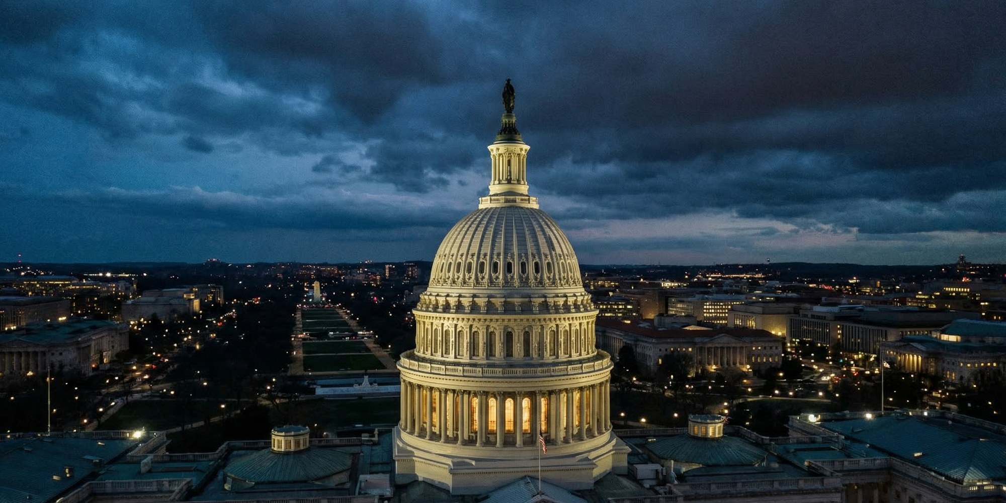 Aerial view of the United States Capitol dome at dusk, representing federal fiscal policy and budget decisions in Washington D.C.