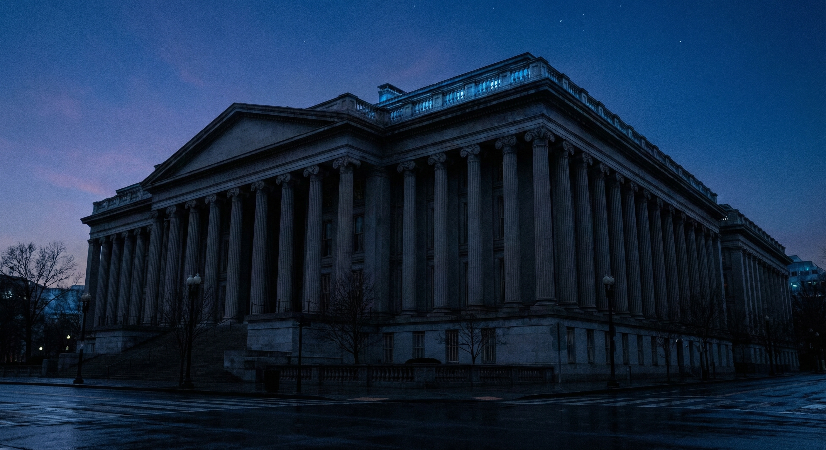 U.S. Treasury Building in Washington DC at dusk, dramatic low-angle view with deep shadows and cool blue tones